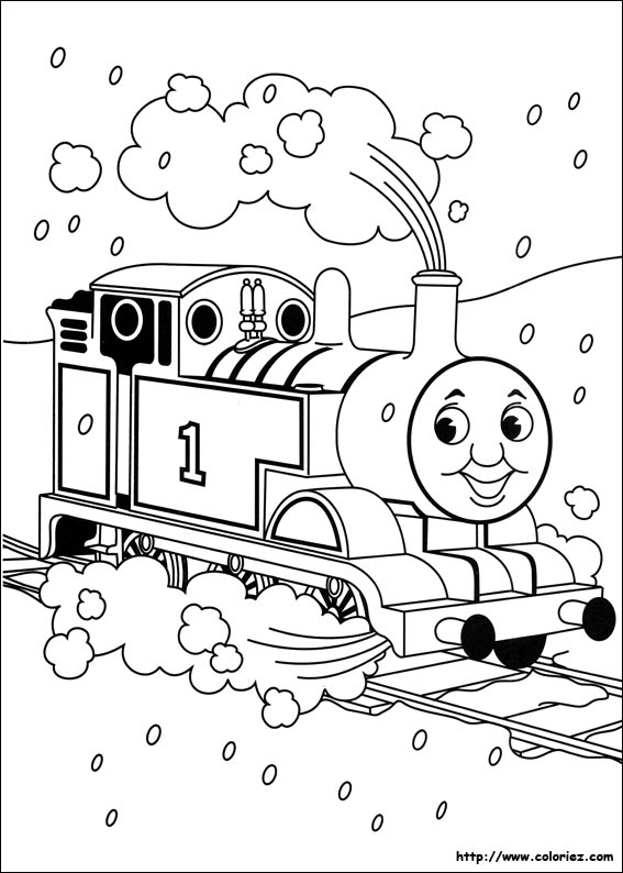 Thomas joyeux sous la neige